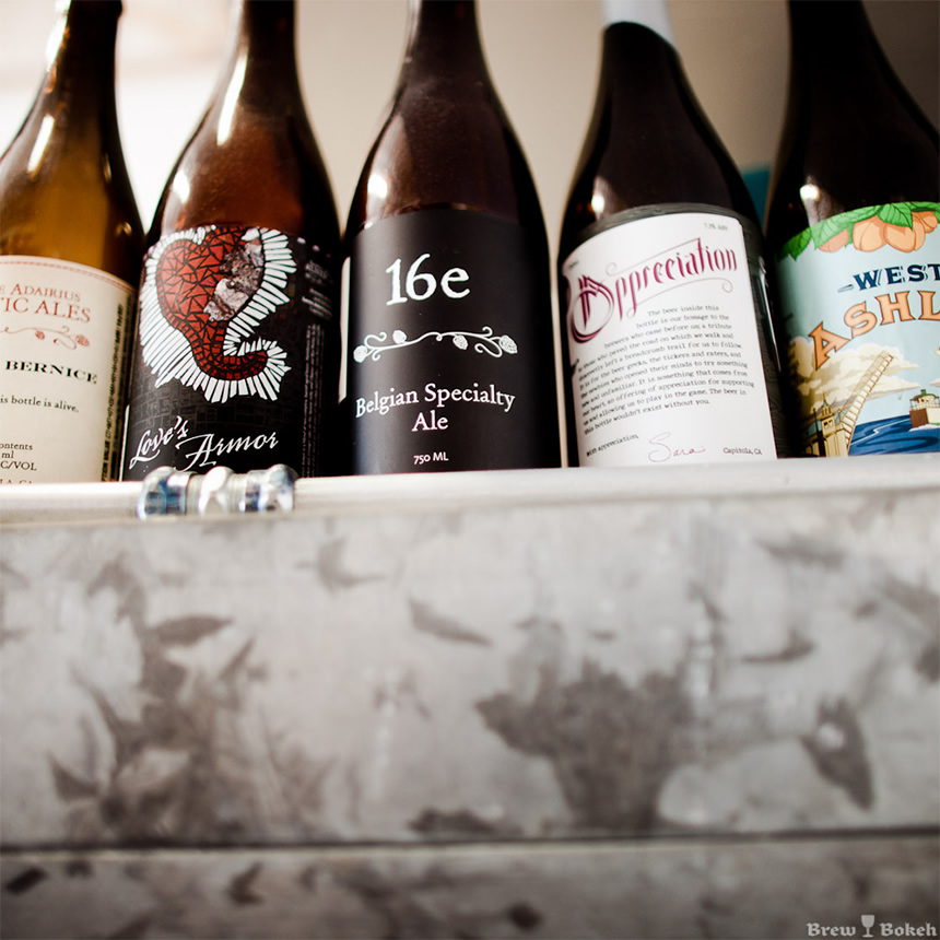 Bottles of beer and their labels from Sante Adairius